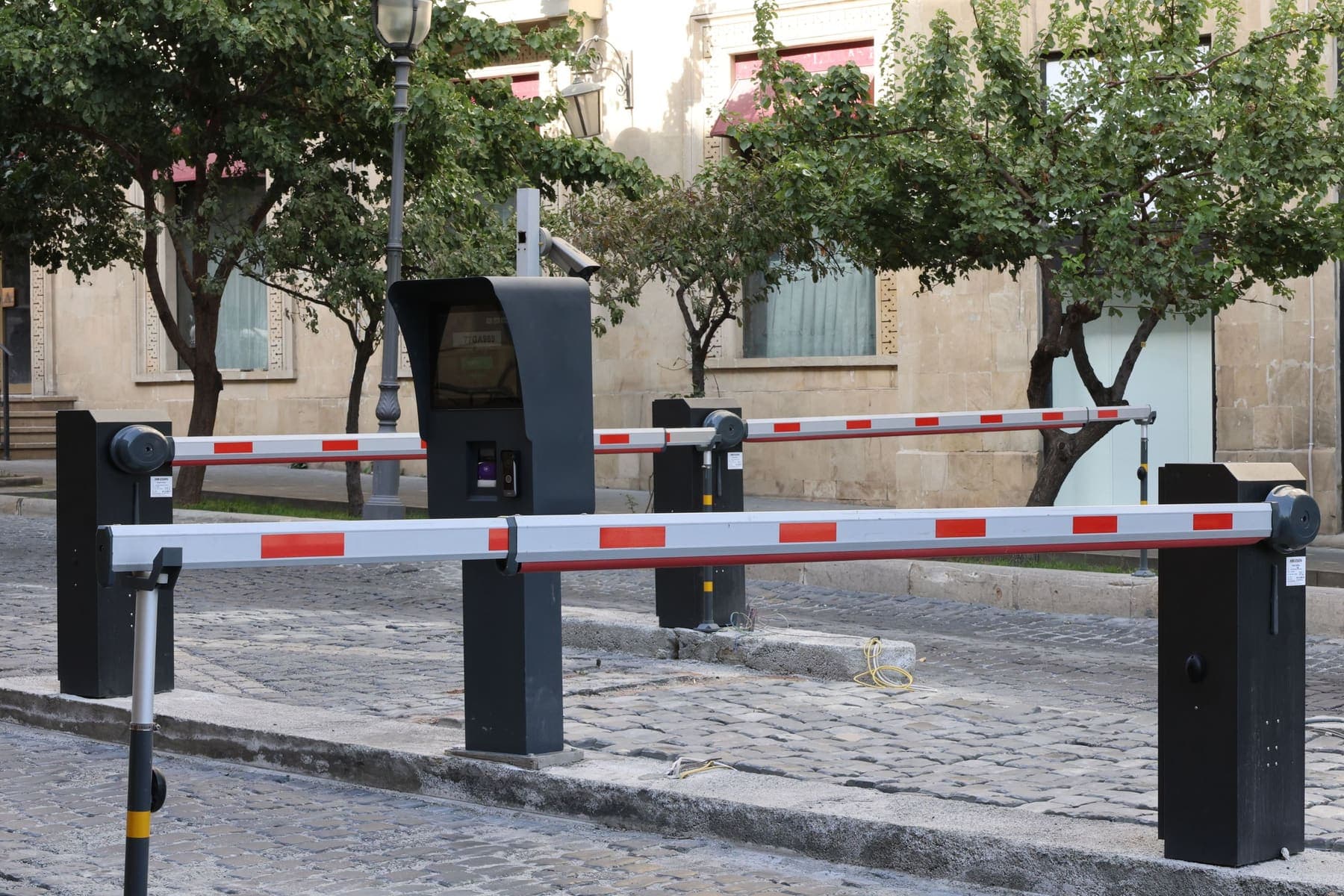 Outdoor parking barrier with a camera post