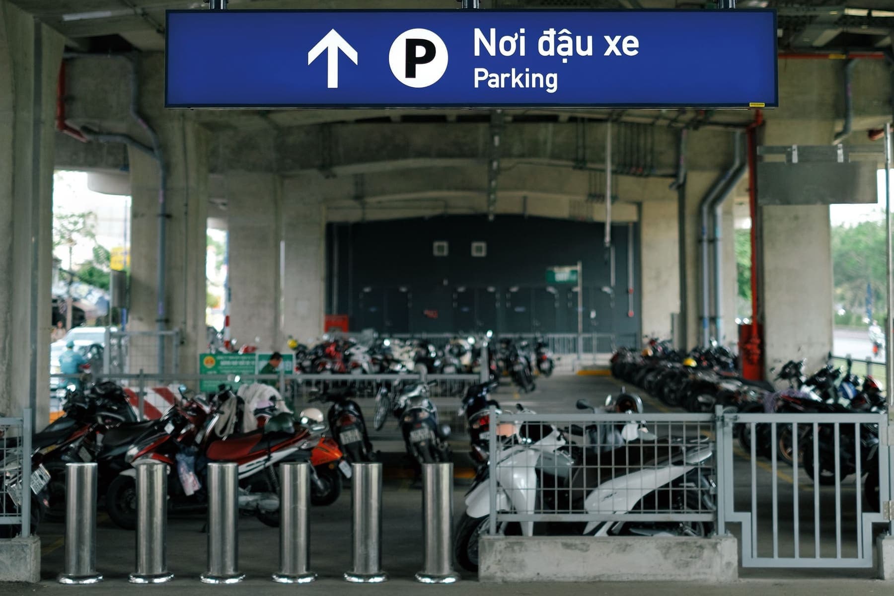 Covered motorbike parking at an apartment building