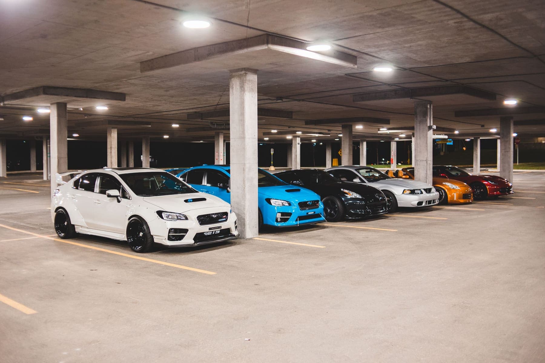 Bright parking garage with marked bays