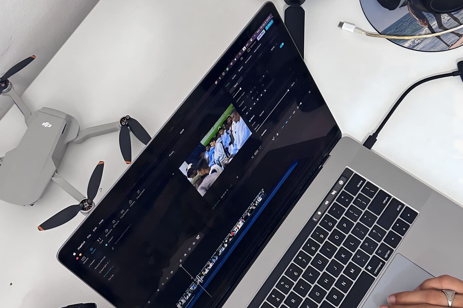 Editing match footage on a laptop