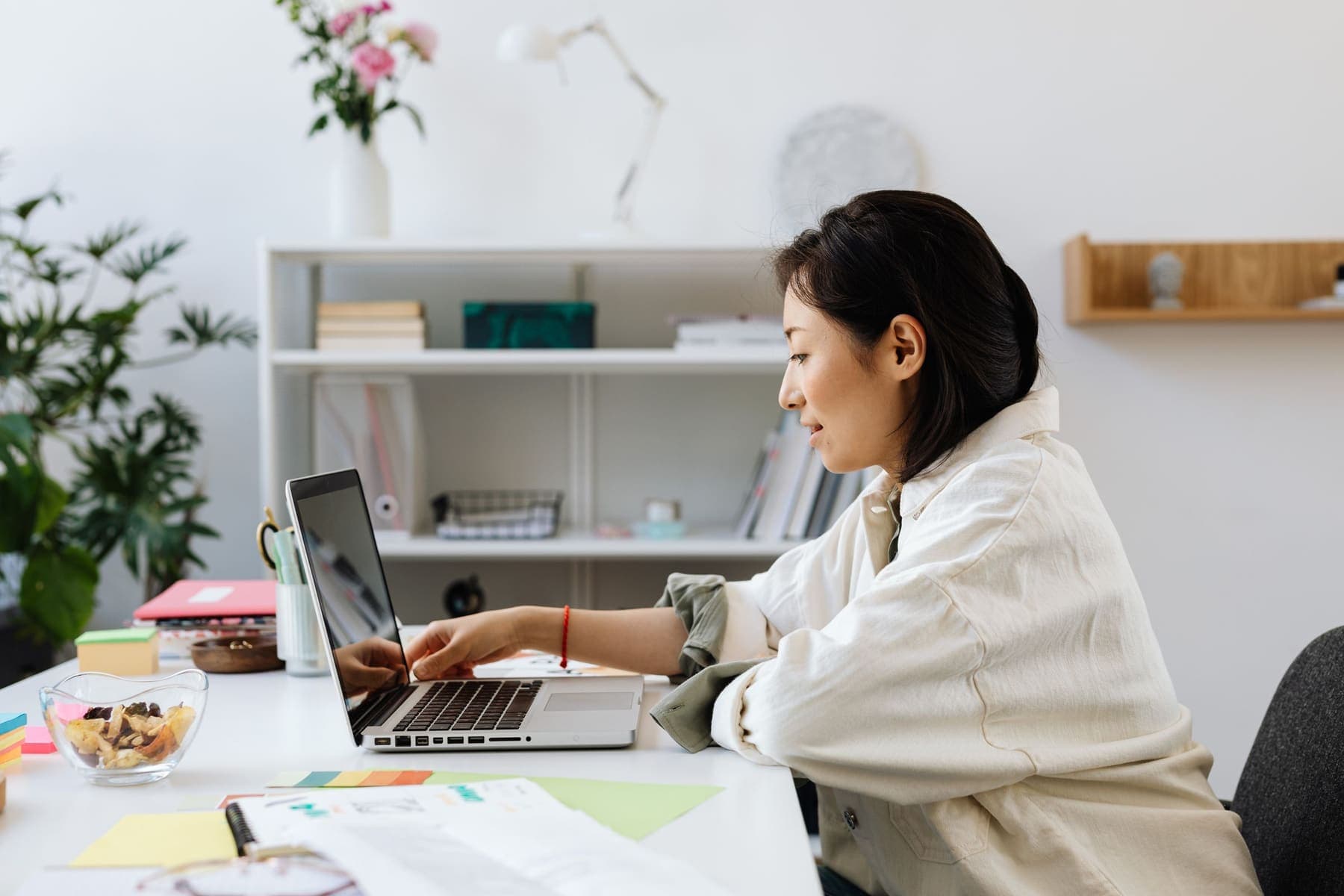 Centre manager evaluating software on a laptop