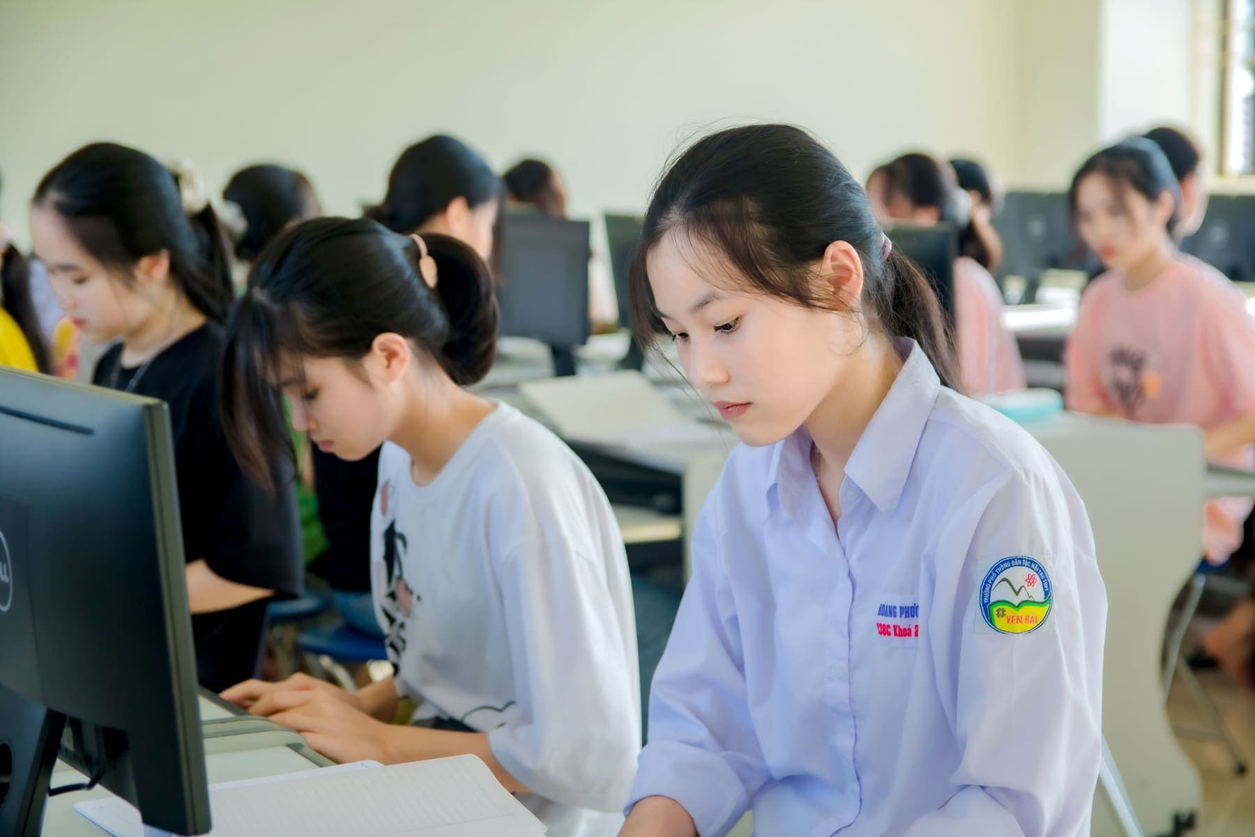 Students working on computers in class